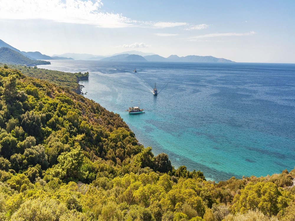 Full-Day Kusadasi Boat Trip: Scenic Stops, Swimming & Lunch | ®ExcursionMania