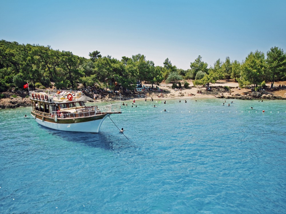 Full-Day Kusadasi Boat Trip: Scenic Stops, Swimming & Lunch | ®ExcursionMania