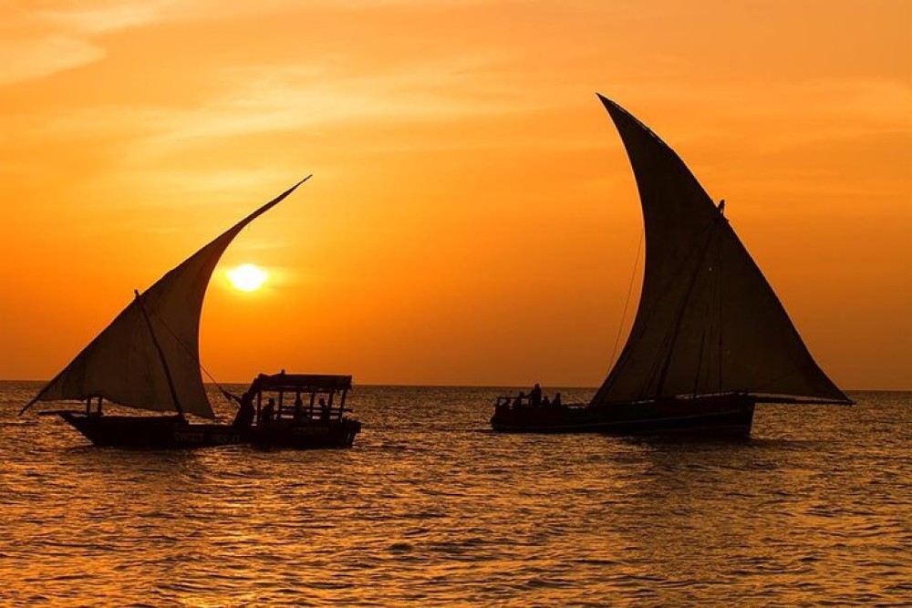 From Nungwi: Guided Sunset Dhow Cruise | ®ExcursionMania