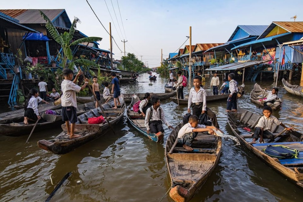 From Siem Reap: Floating Village Tour by Boat | ®ExcursionMania