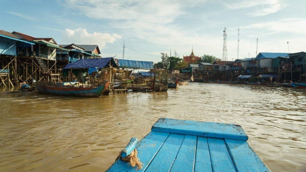 From Siem Reap: Kampong Phluk Floating Village Tour by Boat | ®ExcursionMania