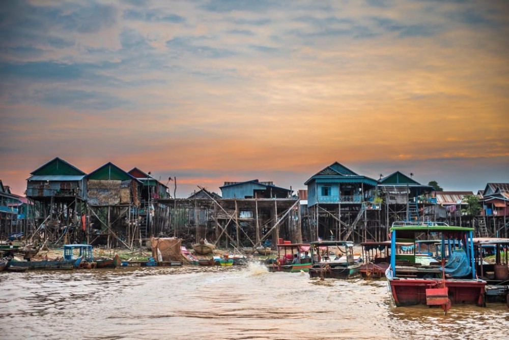 From Siem Reap: Kampong Phluk Floating Village Tour by Boat | ®ExcursionMania