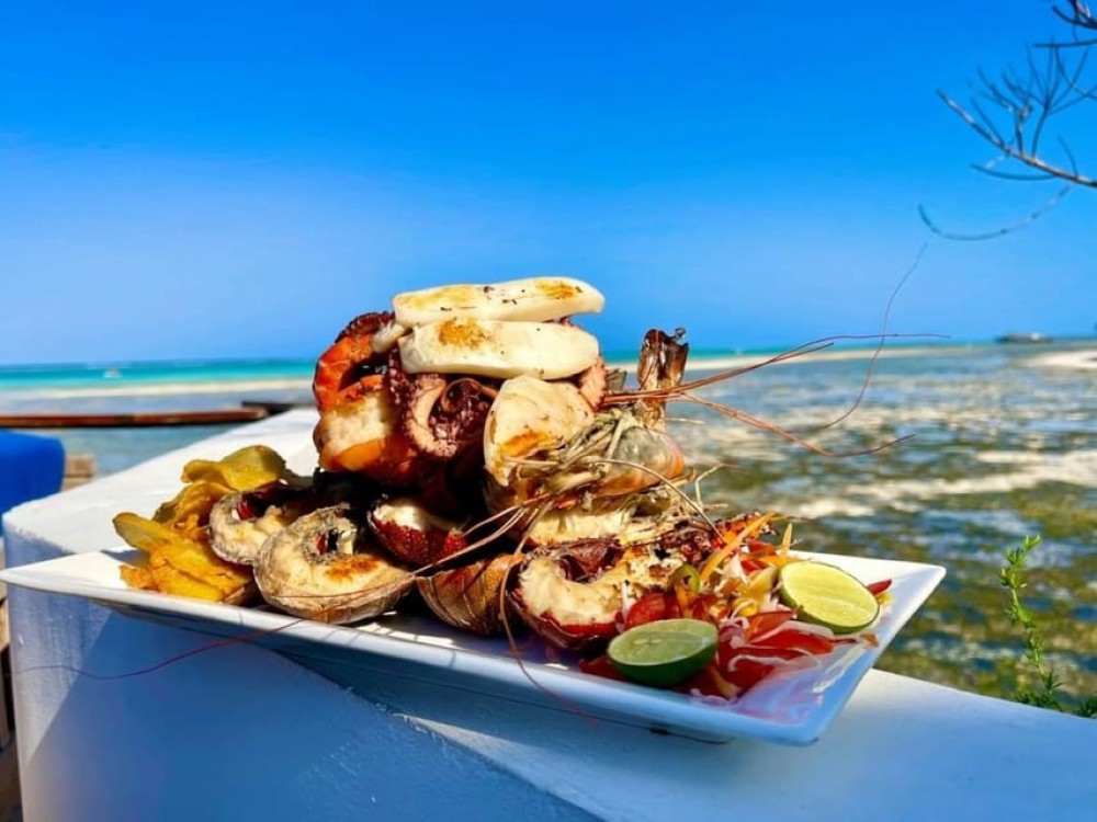 Dolphin Tour, Ngonga Cave, Kuza Cave, Blue Lagoon, The Rock | ®ExcursionMania