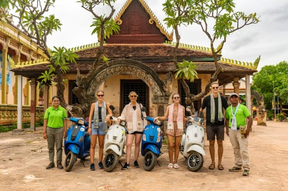 Siem Reap: Floating Village Sunset Boat Guided Vespa Tour | ®ExcursionMania