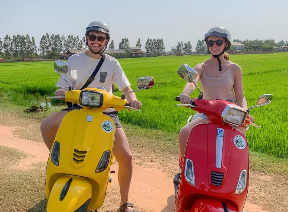 Siem Reap: Floating Village Sunset Boat Guided Vespa Tour | ®ExcursionMania