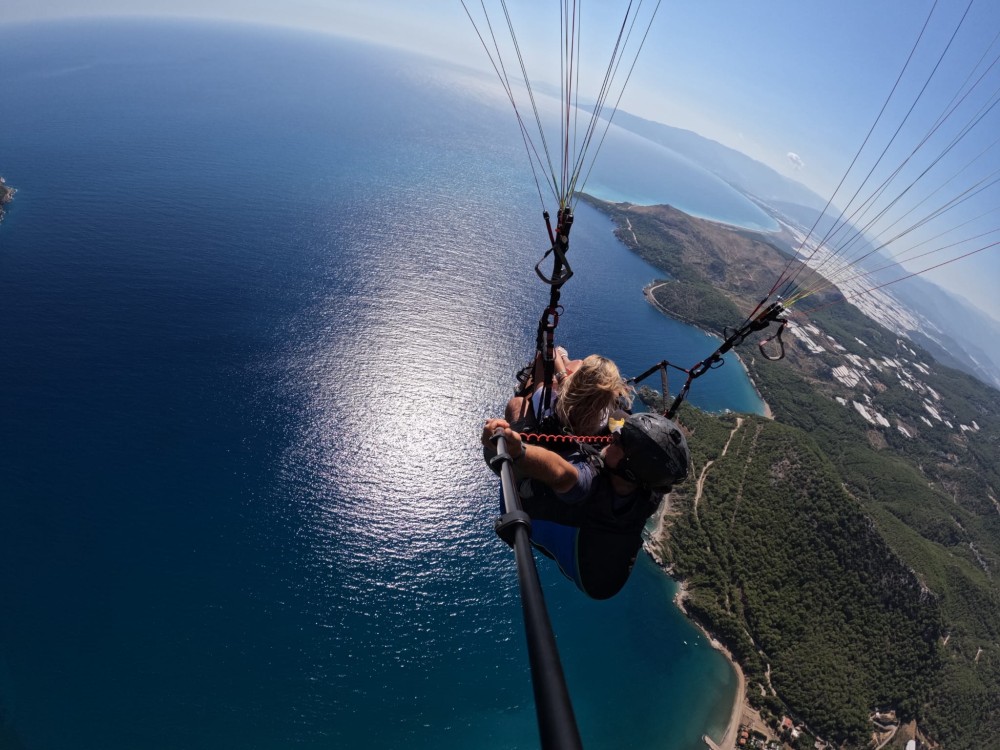 From Antalya: Paragliding Flight at Olympos Tahtali Mountain | ®ExcursionMania
