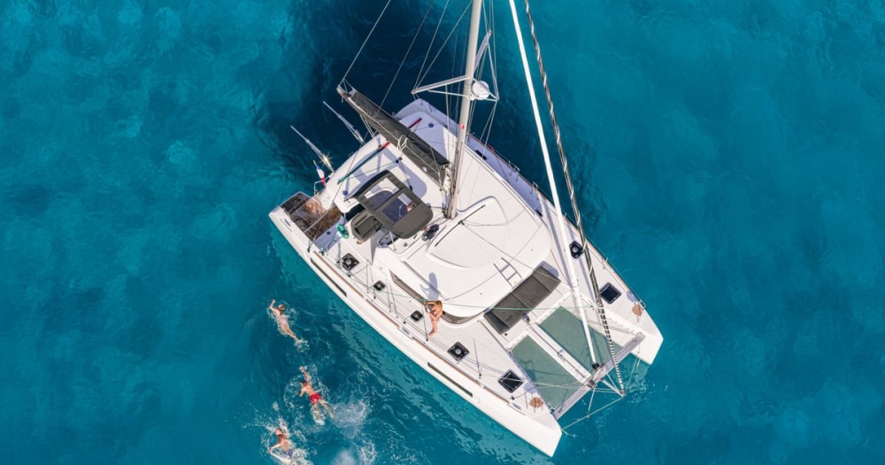 Mykonos Sailing Bliss: Crystal Waters and Authentic Cuisine Await! | ®ExcursionMania